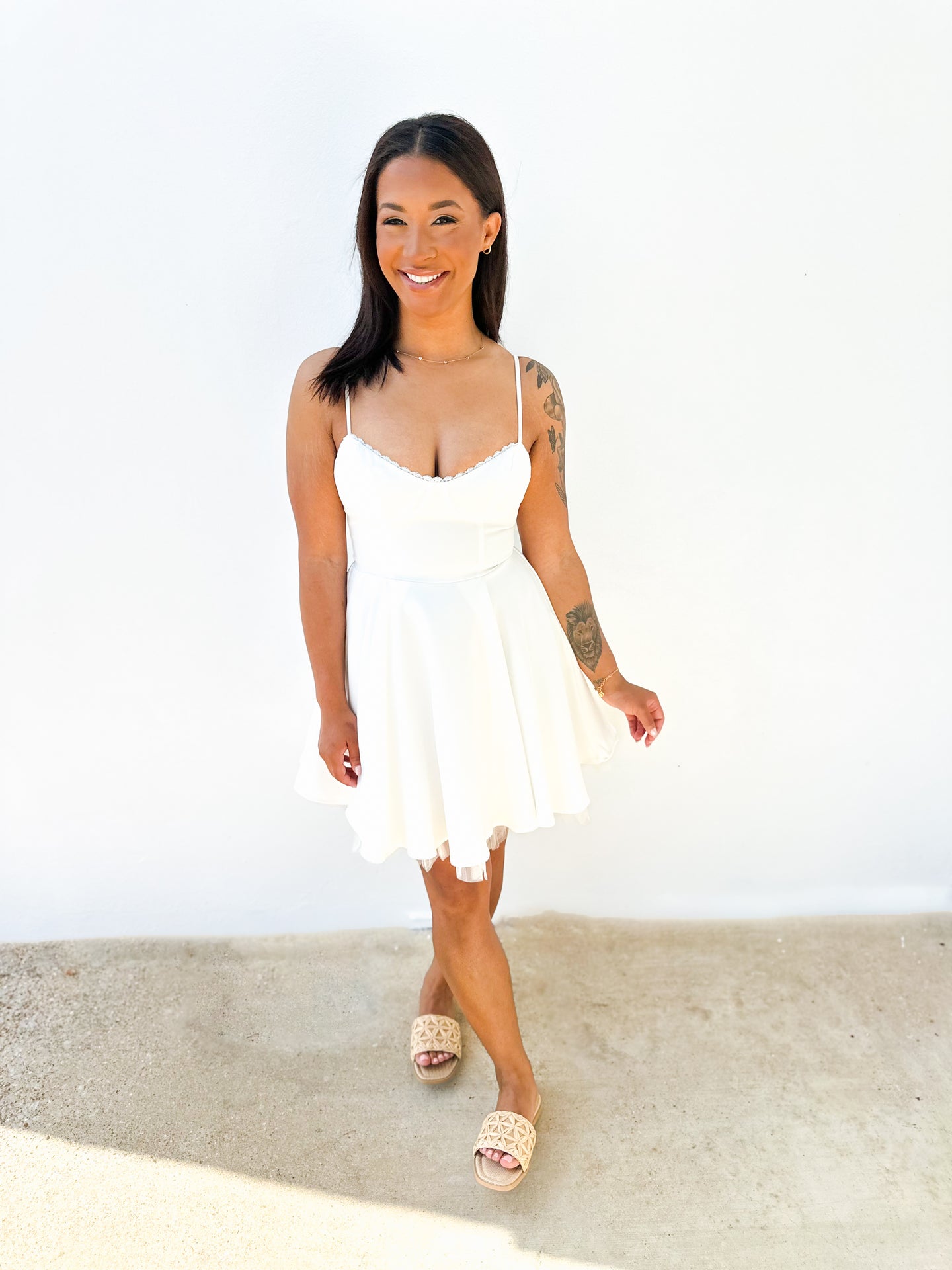Good Girl Sleeveless Mini Dress in White