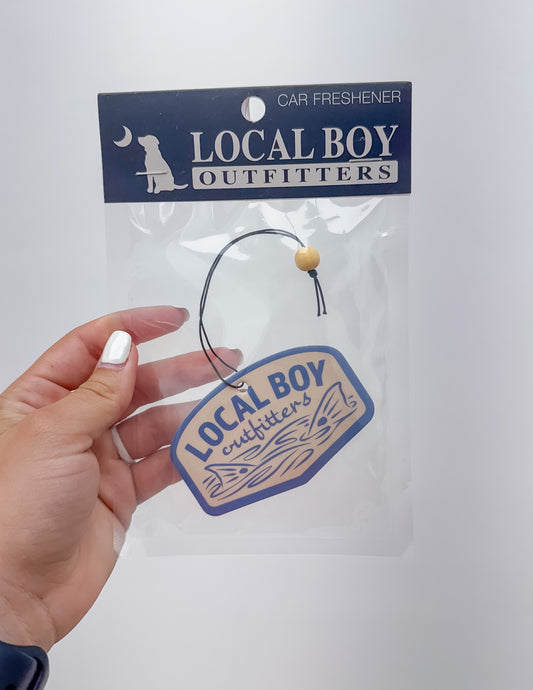 Local Boy Fish Tails Car Freshie in New Car