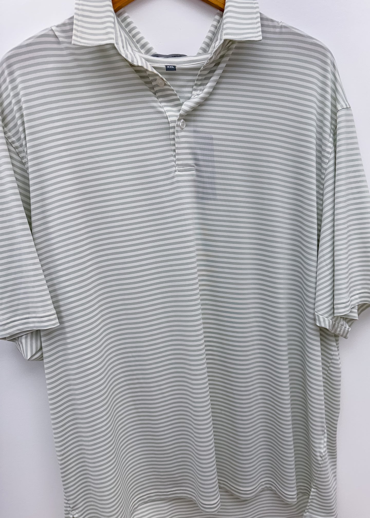 Over Under Performance Polo in Silver Green